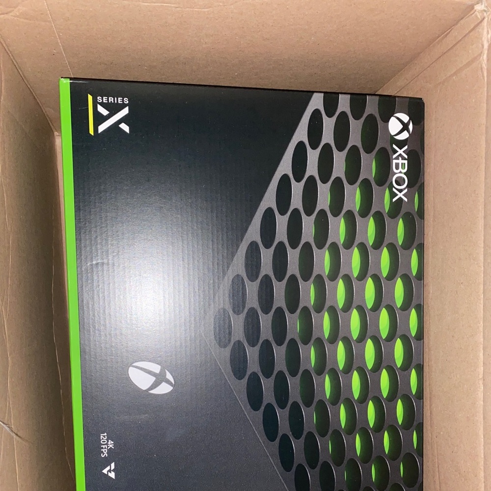 Brand new Xbox series X! Never been used in box with seals!